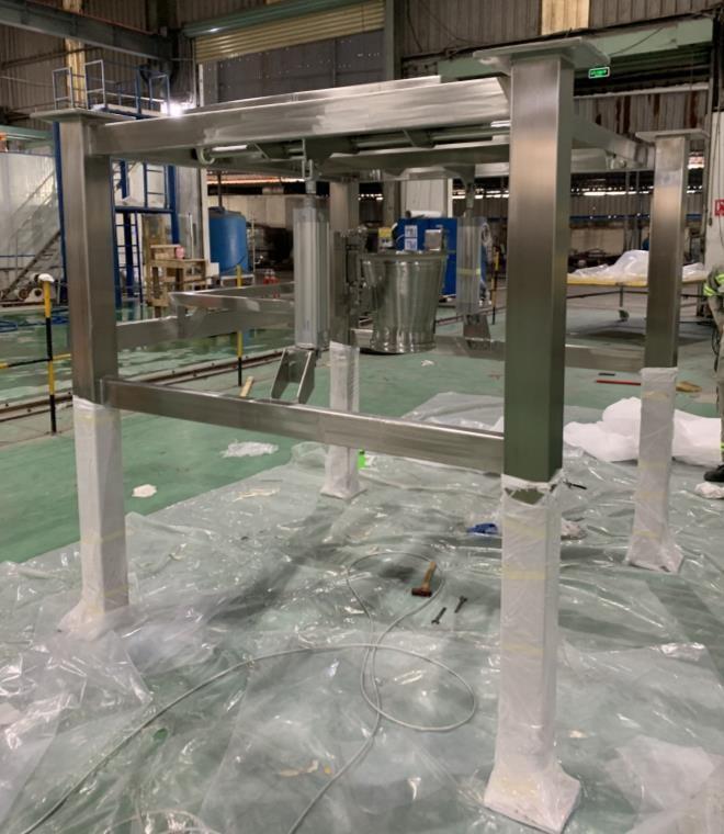 Stainless steel bulk discharger and platform fabricated for Nestlé milk powder plant