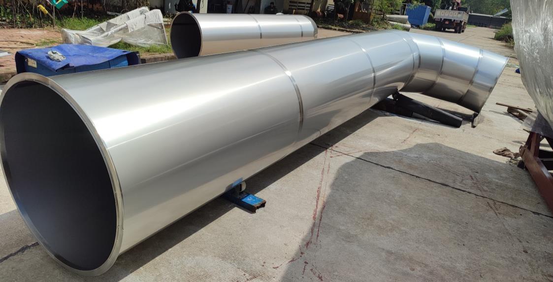 Stainless steel ducting and piping system for powder processing plant